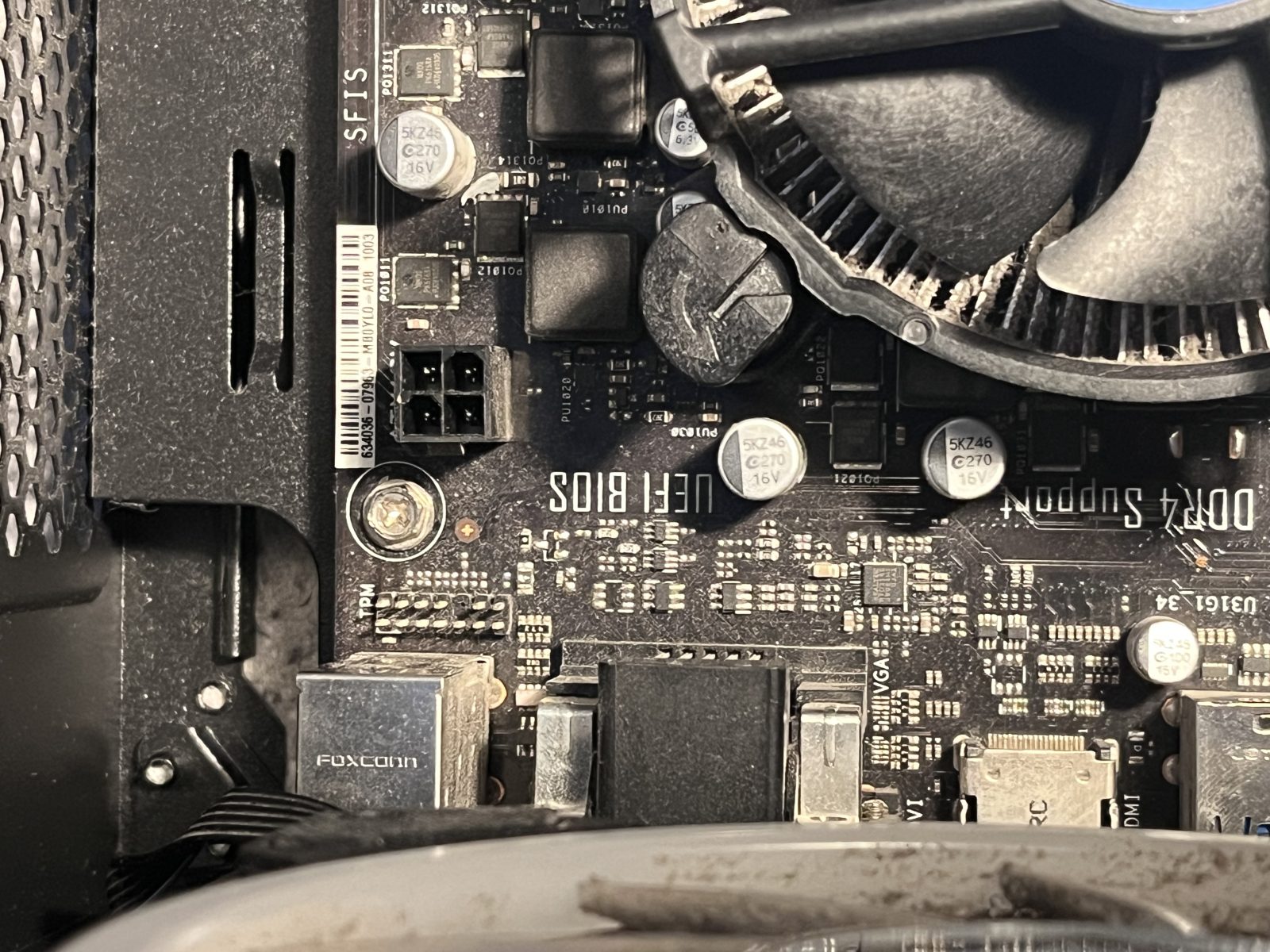 Motherboard screwed down on the standoffs inside the case