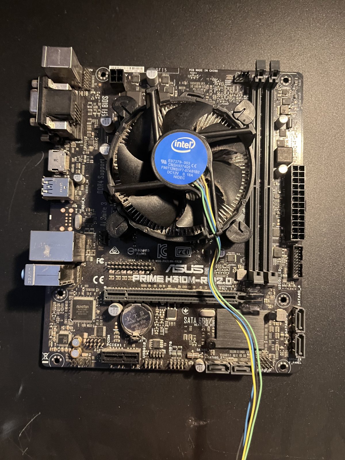 Intel stock cooler mounted on the motherboard