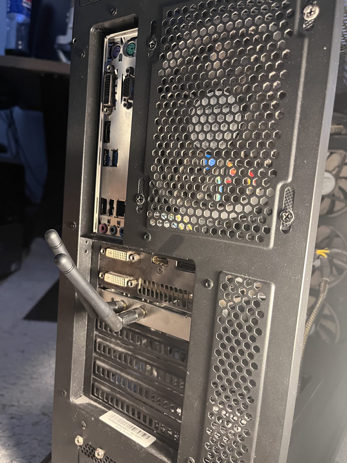 Rear of the completed case showing the I/O ports and graphics outputs